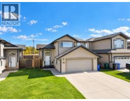 Living room - 5256 48 Street Close, Innisfail, AB T4G0B9 Photo 8