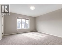 Laundry room - 34 Midtown Crossing Sw, Airdrie, AB T4B5H1 Photo 14