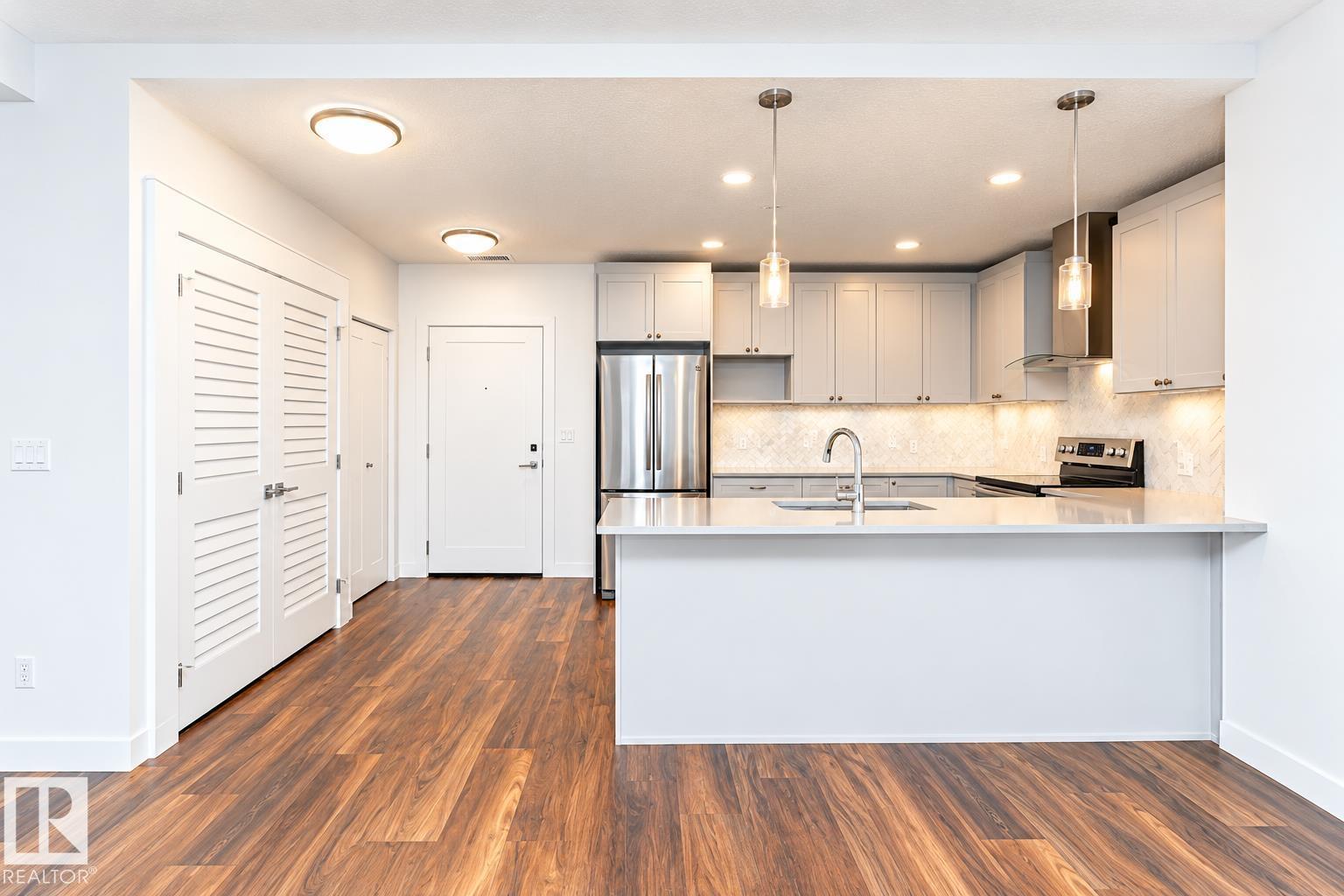 #306 1316 WINDERMERE WY SW - 14