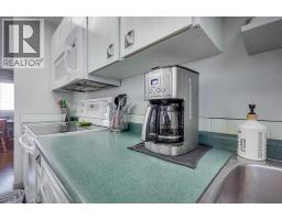 Living room - 18 Greenham Drive, Red Deer, AB T4P2X4 Photo 9
