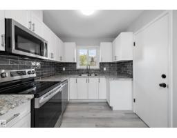 12715 / 12717 93 St Nw, Edmonton, AB T5E3S9 Photo 12