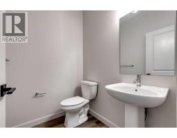 2pc Bathroom - 554 Rivercrest View, Cochrane, AB T4C2W9 Photo 10