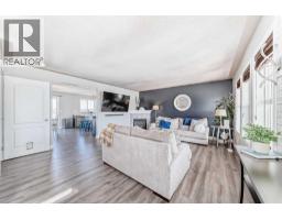Family room - 22 Moe Avenue Nw, Langdon, AB T0J1X2 Photo 17