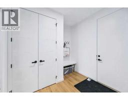 Bedroom - 141 Wolf Hollow Villas Se, Calgary, AB T2X5K1 Photo 11