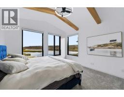 Bedroom - 141 Wolf Hollow Villas Se, Calgary, AB T2X5K1 Photo 12