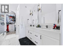 Family room - 141 Wolf Hollow Villas Se, Calgary, AB T2X5K1 Photo 13