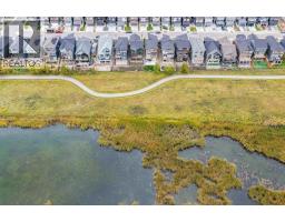 141 Wolf Hollow Villas Se, Calgary, AB T2X5K1 Photo 24