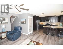 Living room - 12 Country Hills Gate Nw, Calgary, AB T3K5C8 Photo 14