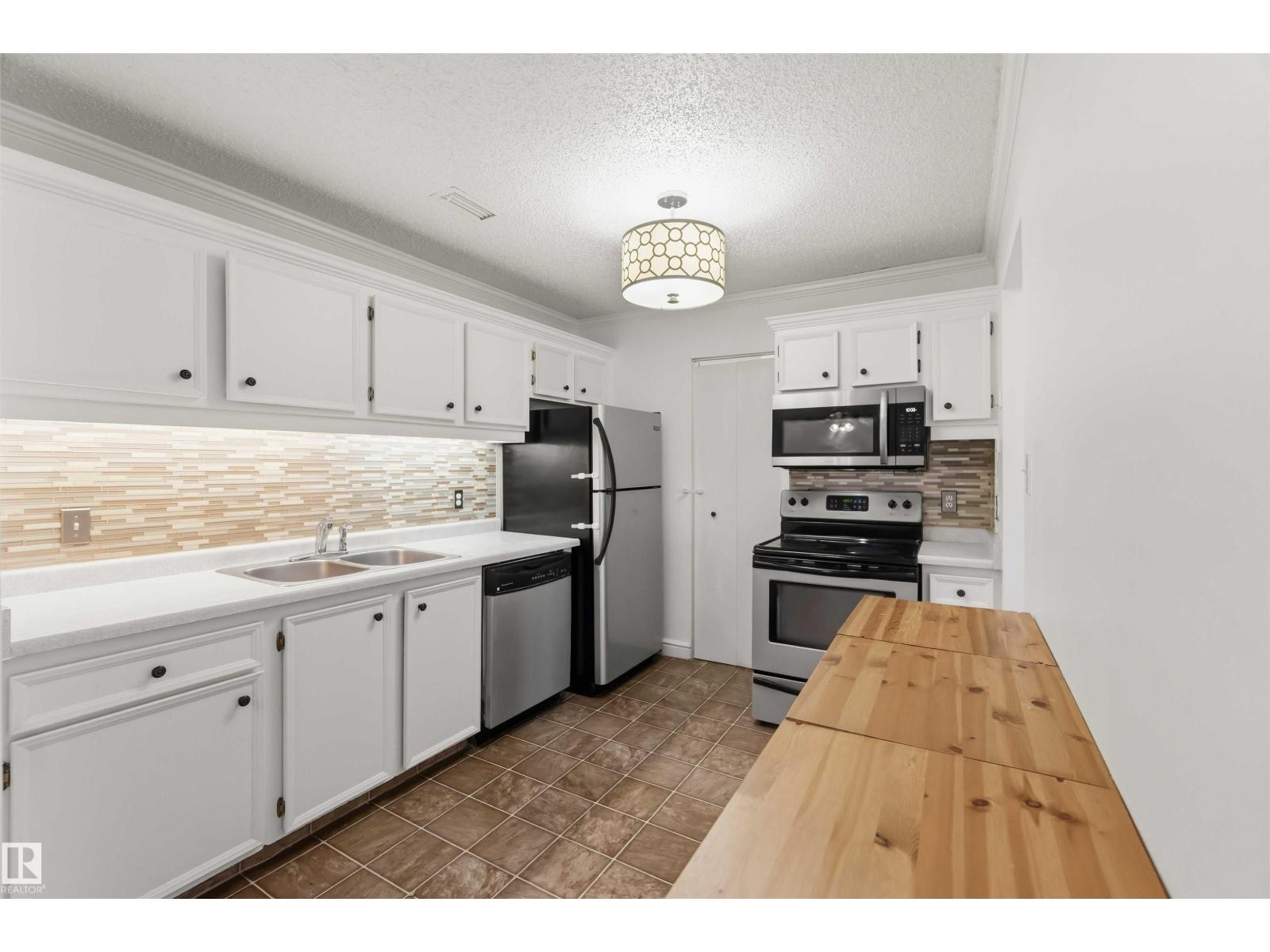 #2 2703 79 ST NW - 11