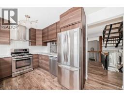 4pc Bathroom - 7, 10401 19 Street Sw, Calgary, AB T2W3E7 Photo 10