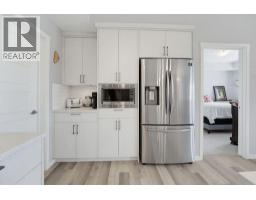 204, 300 Harvest Hills Place NE - photo 6