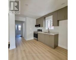 Living room - Main - 293 Glebemount Avenue, Toronto, ON M4C3V4 Photo 6