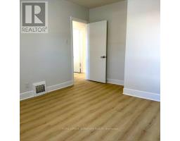 Bedroom 3 - Main - 293 Glebemount Avenue, Toronto, ON M4C3V4 Photo 9