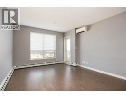 Living room - 606, 136c Sandpiper Road, Fort Mcmurray, AB T9K0J7 Photo 8