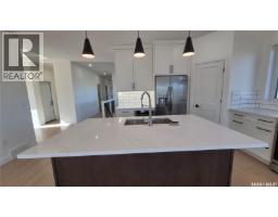 Laundry room - 5 Aaron Court, Pilot Butte, SK S0G3Z0 Photo 10