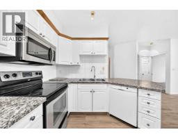 Laundry room - 1315, 7451 Springbank Boulevard Sw, Calgary, AB T3H4K5 Photo 9
