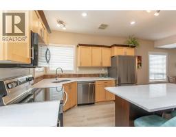 Living room - 56, 45 Ironstone Drive, Red Deer, AB T4R0A9 Photo 11