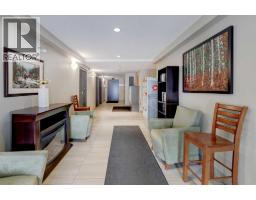 303, 406 Cranberry Park SE - photo 4