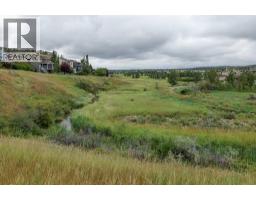 102, 39 Hidden Creek Place Nw, Calgary, AB T3A6B9 Photo 33