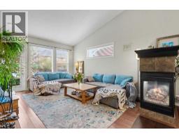 Family room - 541 Boulder Creek Green Se, Langdon, AB T0J1X3 Photo 10
