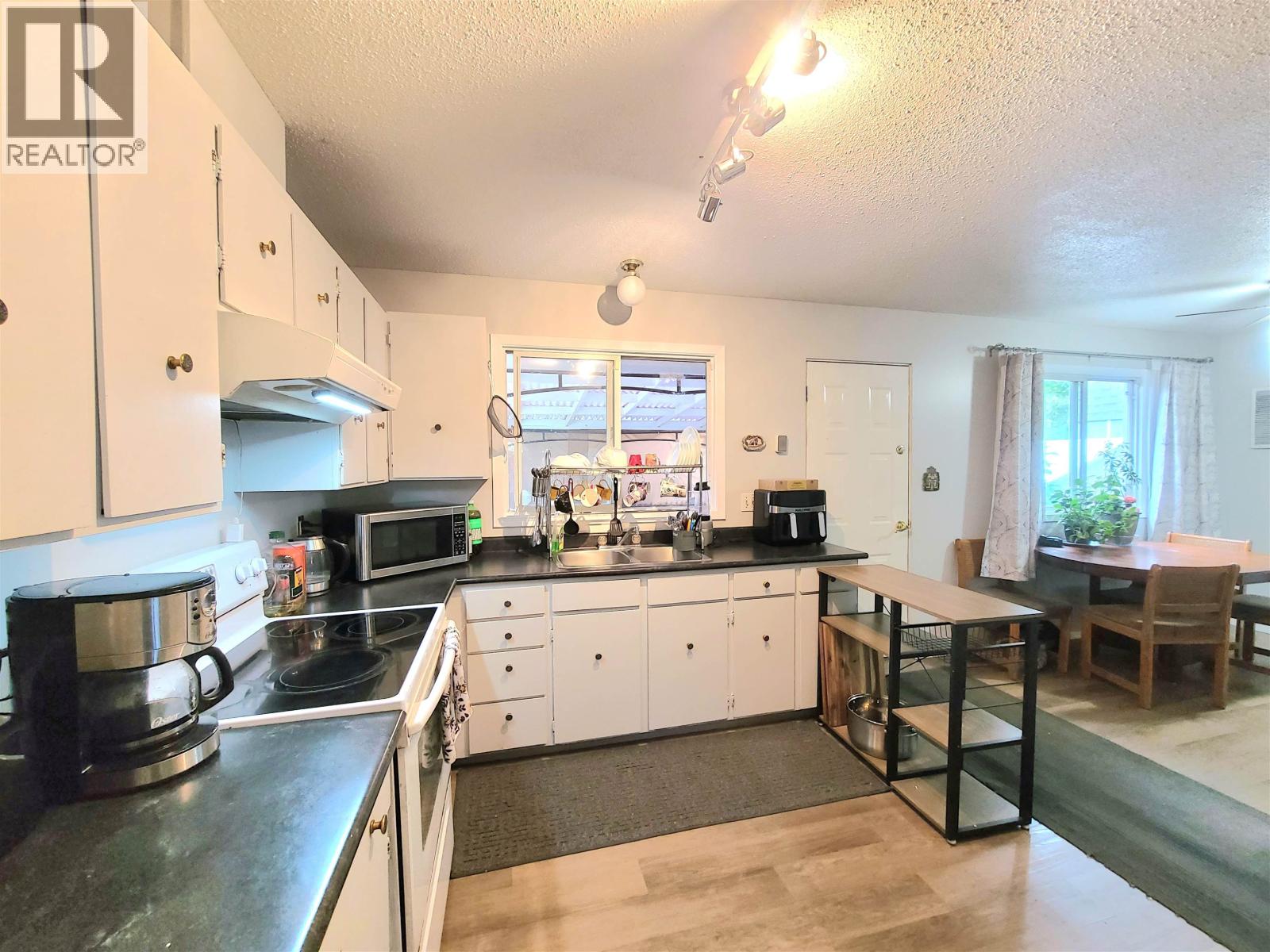 Photo 9 of 26 — 1385 MILBURN AVENUE · Prince George, BC