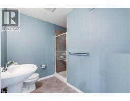 101, 703 Luxstone Square Sw, Airdrie, AB T4B0A3 Photo 26