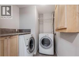 101, 703 Luxstone Square Sw, Airdrie, AB T4B0A3 Photo 27