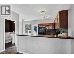Bedroom - 101, 703 Luxstone Square Sw, Airdrie, AB T4B0A3 Photo 7