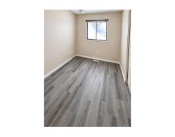 Bedroom 2 - 14212 114 St Nw, Edmonton, AB T5X3Z8 Photo 6