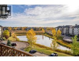 8412, 304 Mackenzie Way SW - photo 5