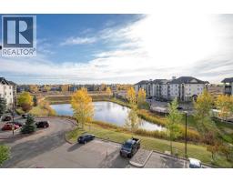 8412, 304 Mackenzie Way SW - photo 9