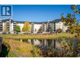 8412, 304 Mackenzie Way SW - photo 2
