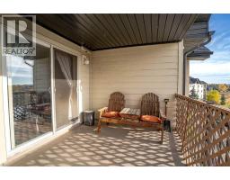 8412, 304 Mackenzie Way SW - photo 7