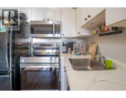 8412, 304 Mackenzie Way SW - photo 14