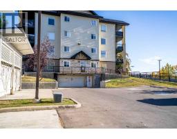 8412, 304 Mackenzie Way SW - photo 1