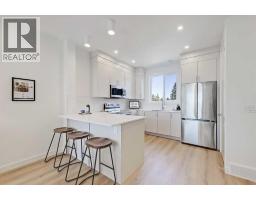 8, 828 8 Avenue NE - photo 1