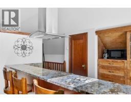 Kitchen - 1981 Dzini Rd, Black Creek, BC V9J1H1 Photo 11