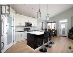 Living room - 616 Heritage Drive, Fort Mcmurray, AB T9K2X1 Photo 6