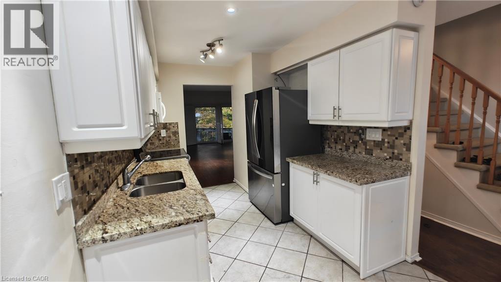 2110 CLEAVER Avenue Unit# 215, Burlington — photo 11