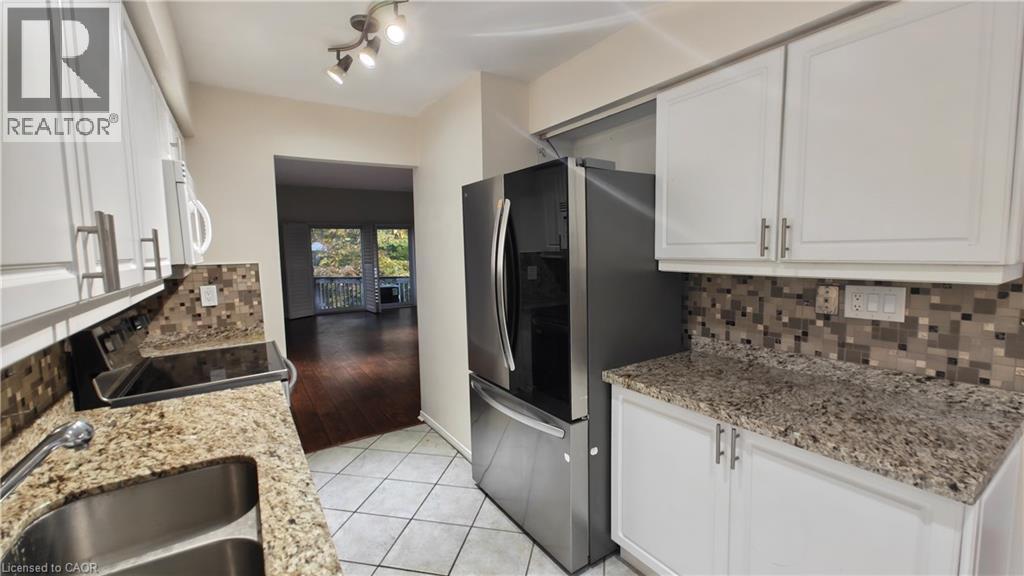 2110 CLEAVER Avenue Unit# 215, Burlington — photo 10