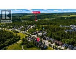 Den - 83 Discovery Ridge Boulevard Sw, Calgary, AB T2H4Y2 Photo 6