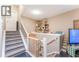 Living room - 91 Baysprings Way Sw, Airdrie, AB T4B4C4 Photo 6