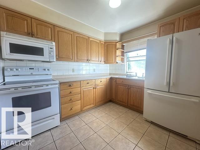 11622 133 Street NW, Woodcroft — photo 6 of 30: Property photo