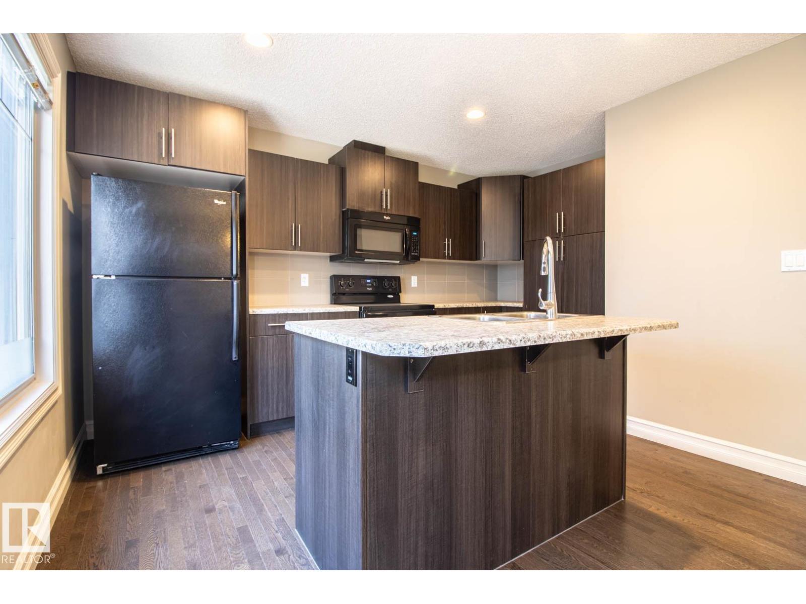 #46 – 5317 3 Avenue SW, Charlesworth — photo 19 of 30: Property photo