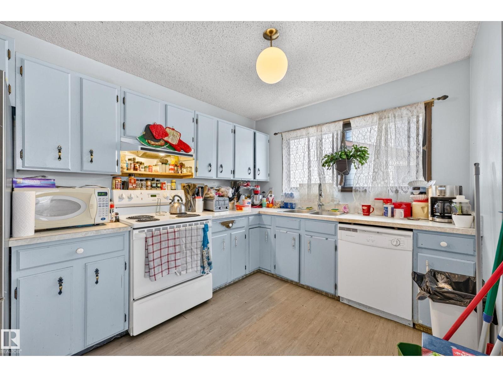 3819 17A Avenue NW, Daly Grove — photo 7 of 30: Property photo
