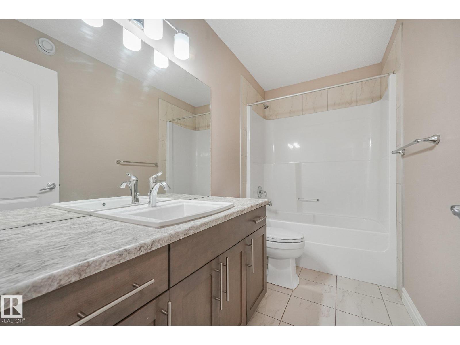 2304 89 Street SW, Summerside — photo 28 of 30: Property photo