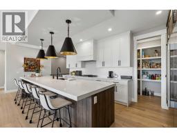 Laundry room - 13 Sunvalley View, Cochrane, AB T4C0X8 Photo 10