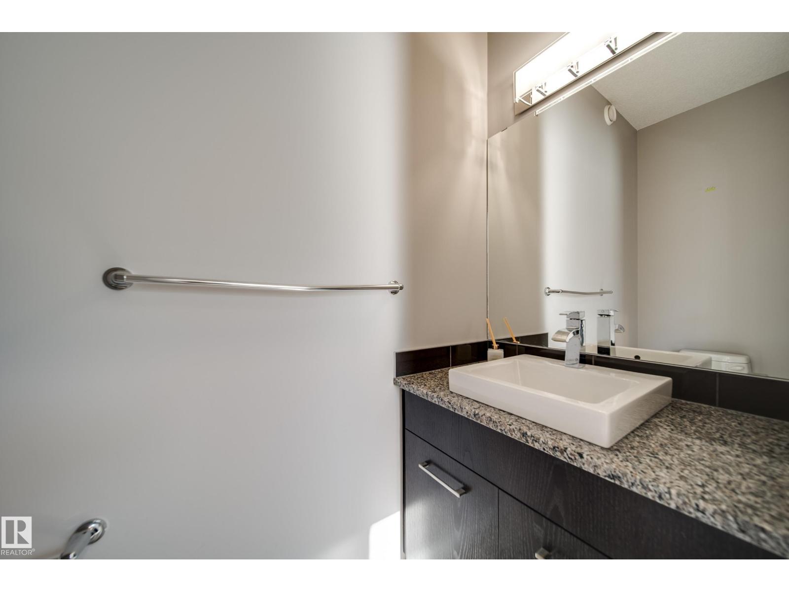 15927 13 Avenue SW, Glenridding Heights — photo 24 of 30: Property photo