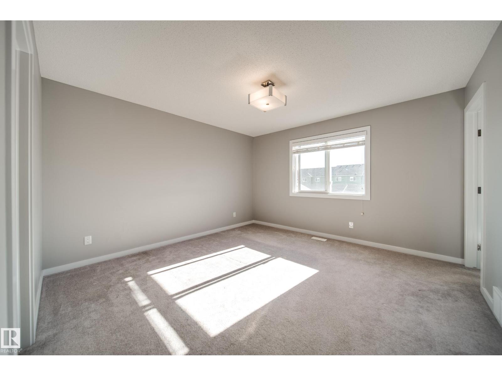 15927 13 Avenue SW, Glenridding Heights — photo 29 of 30: Property photo