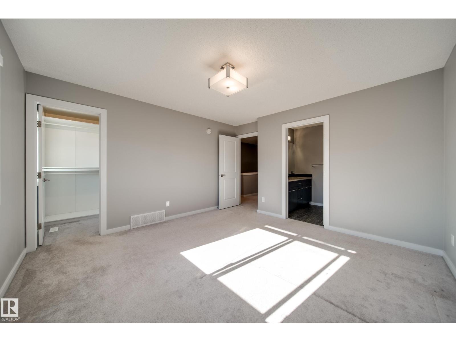 15927 13 Avenue SW, Glenridding Heights — photo 30 of 30: Property photo